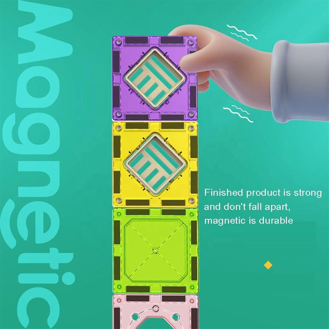 Close-up of the magnetic tiles being connected by a child's hands