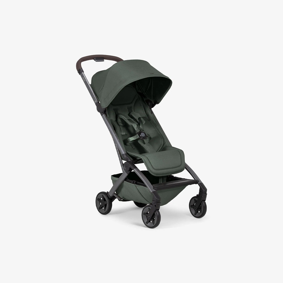 Front view of the Joolz Aer2 Buggy in the nature-inspired Forest Green color, featuring a premium fabric finish and brown leatherette handlebar.
