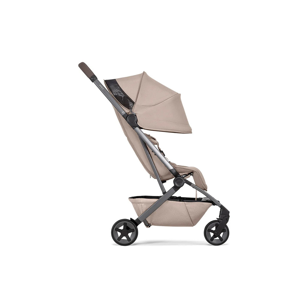 Side view of the Joolz Aer2 buggy in the upright position, showcasing the ergonomic seat design, sturdy lightweight frame, and stylish Sandy Taupe fabric.