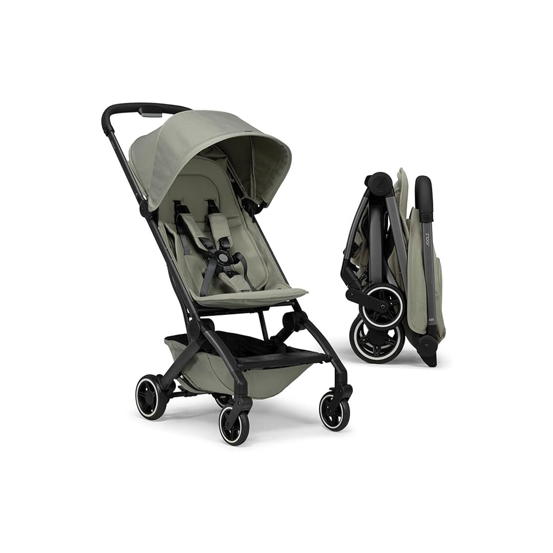 Side view of the Joolz Aer+ Carrycot in Forest Green attached to the stroller frame, showing the sleek design and spacious bassinet for newborns.