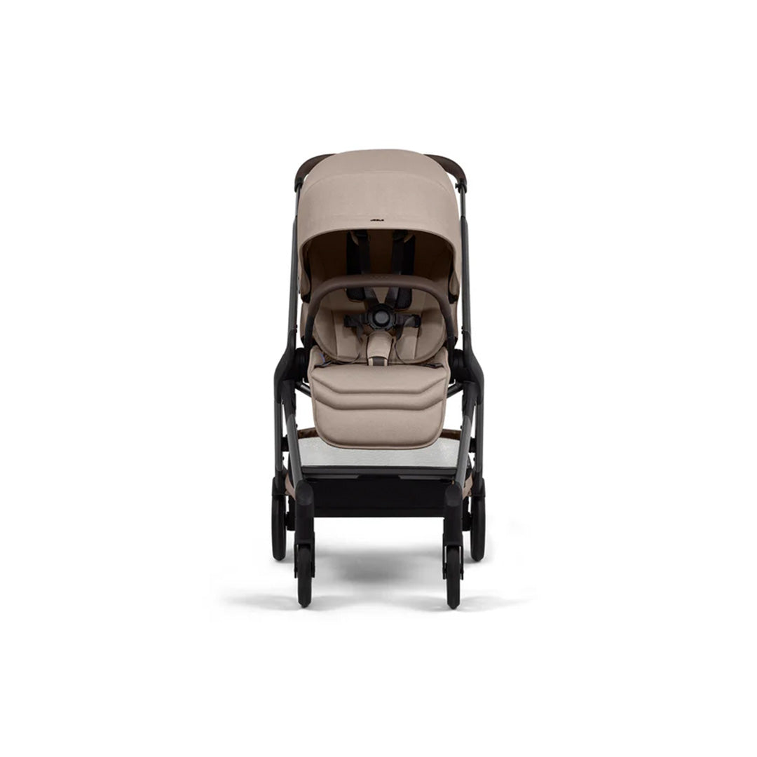 Front view of the Joolz Hub² Stroller in the stylish Sandy Taupe colorway, featuring a compact frame and mid-sized wheels for smooth city rides.
